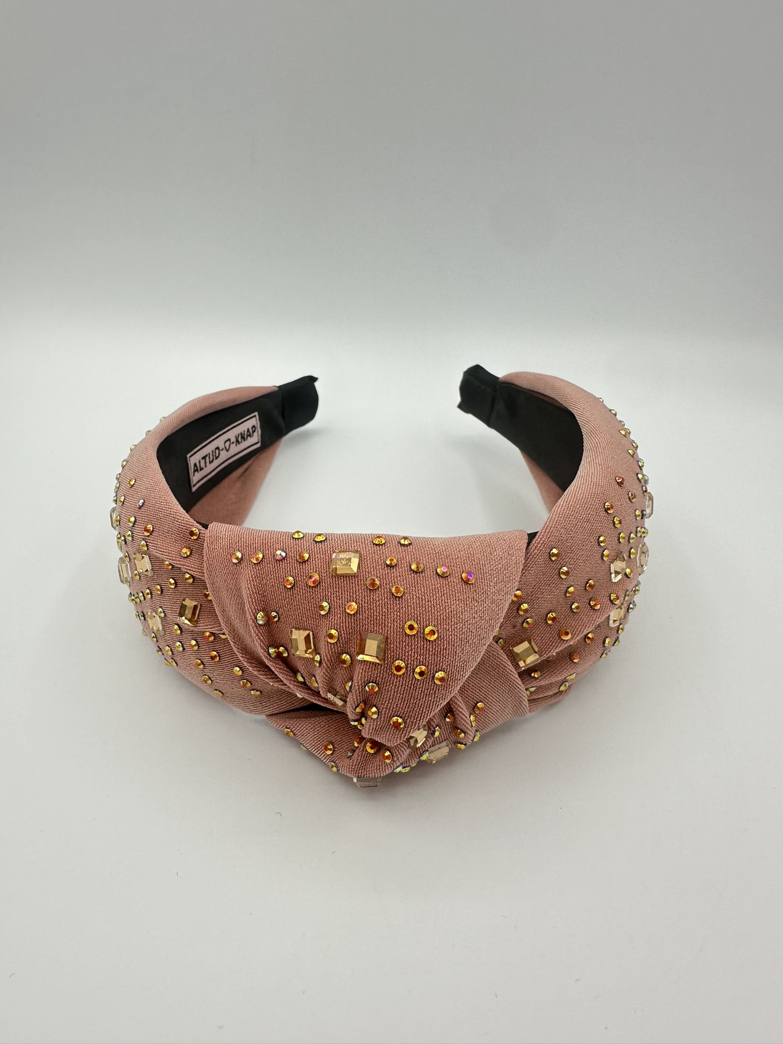 Dameshaarband Twinkling Moonlight Roze met knoop en studs